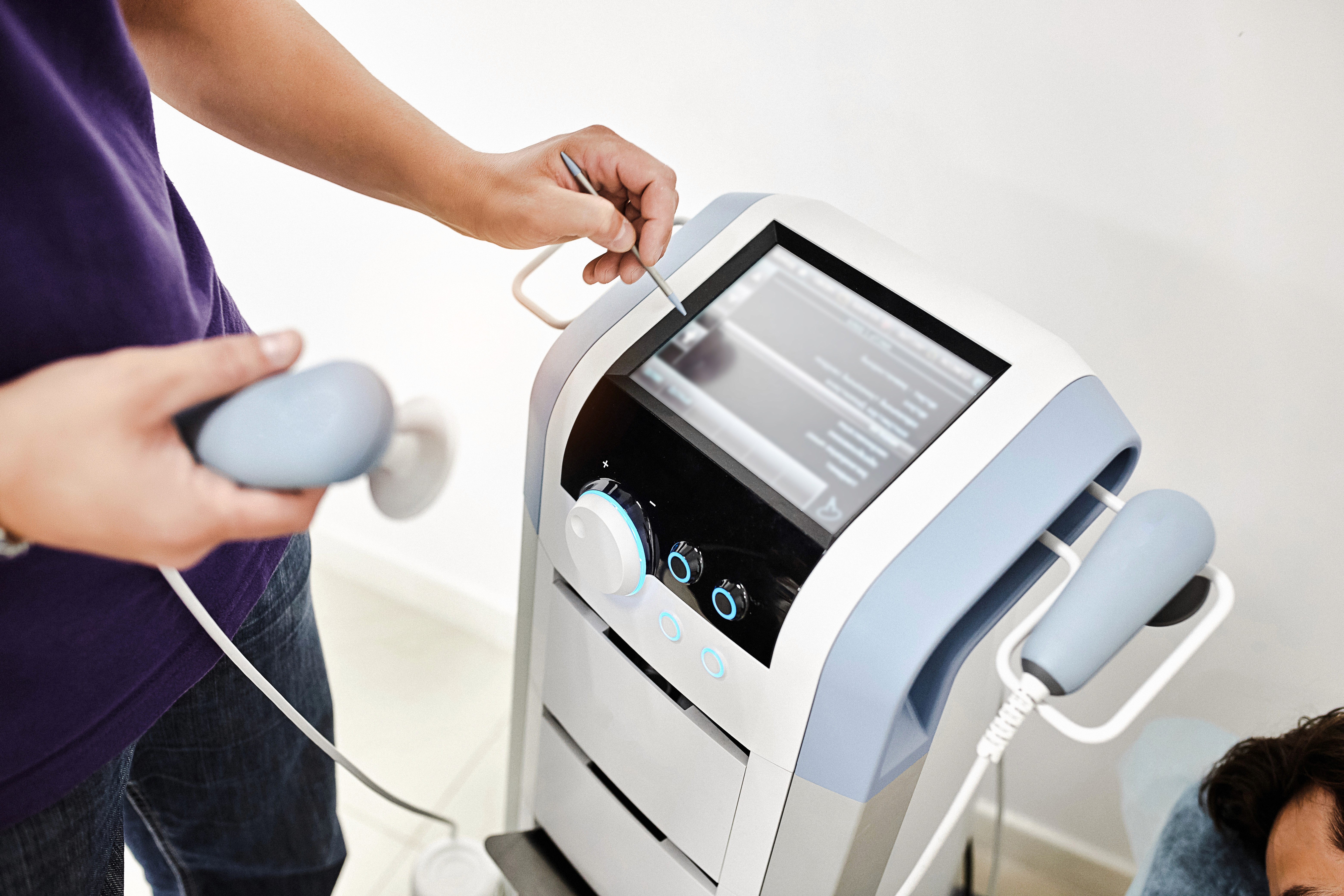 Modern dental clinic chair with equipment in a clean treatment room