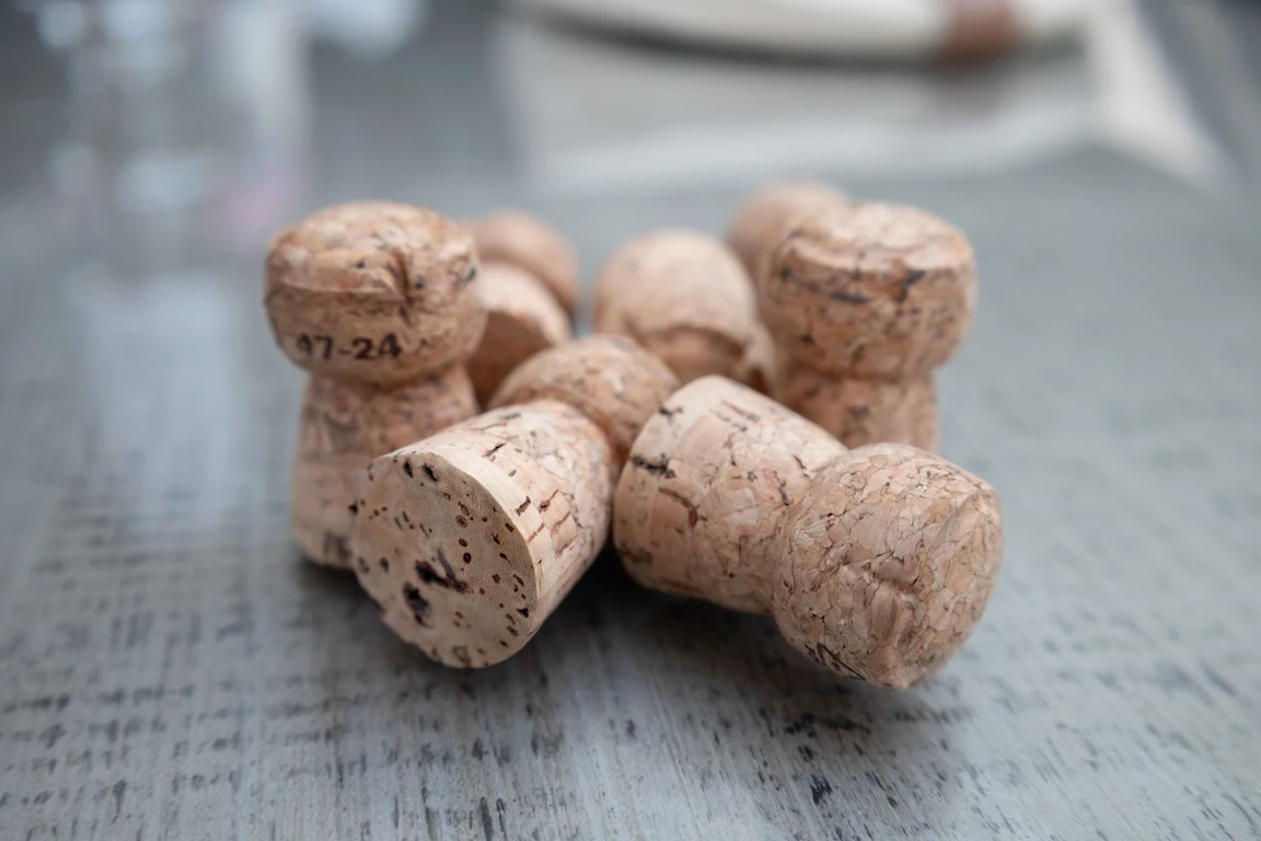 Close-up of champagne corks from a wedding celebration