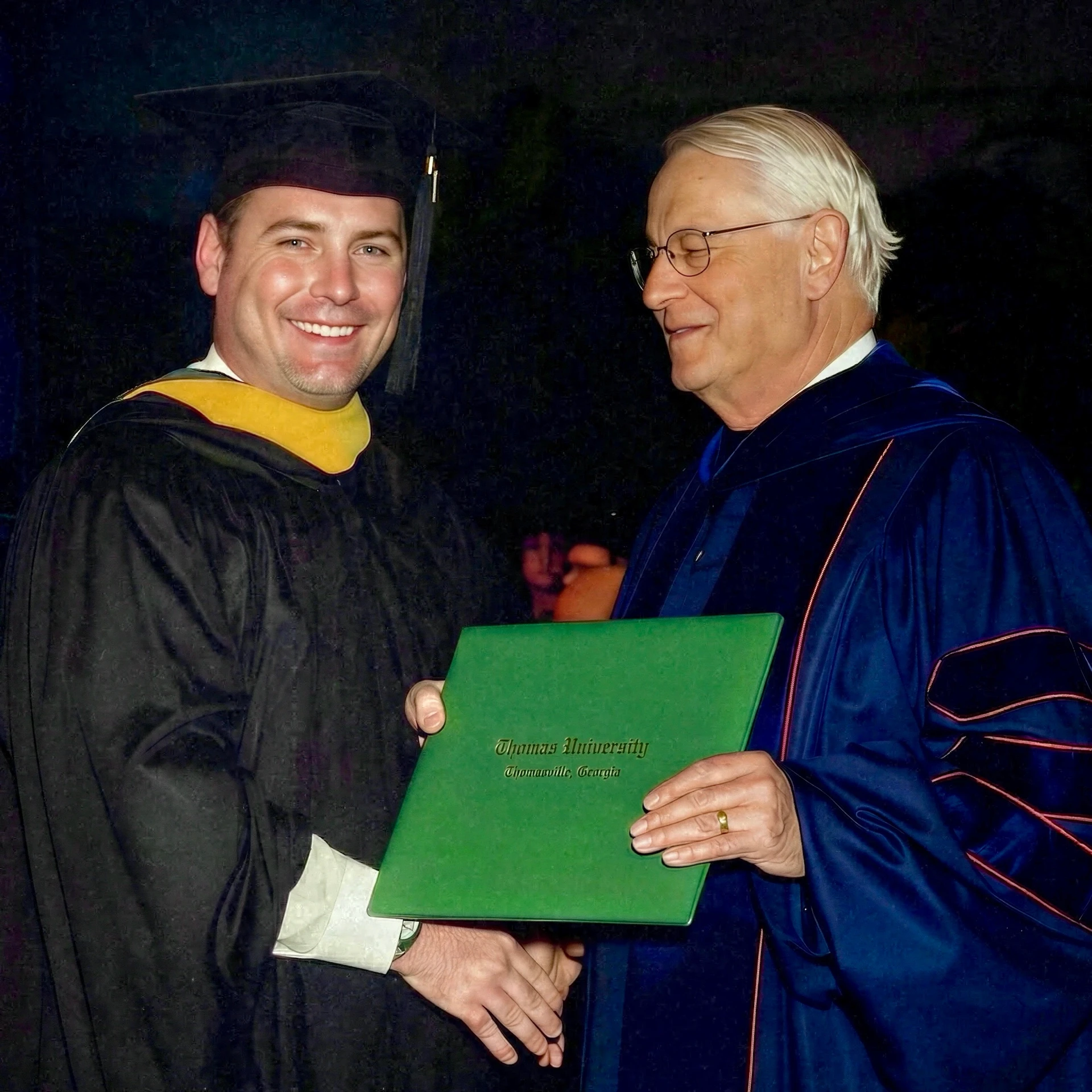 Paul Adams receiving his diploma at Thomas University commencement in Thomasville, Georgia, May 2006