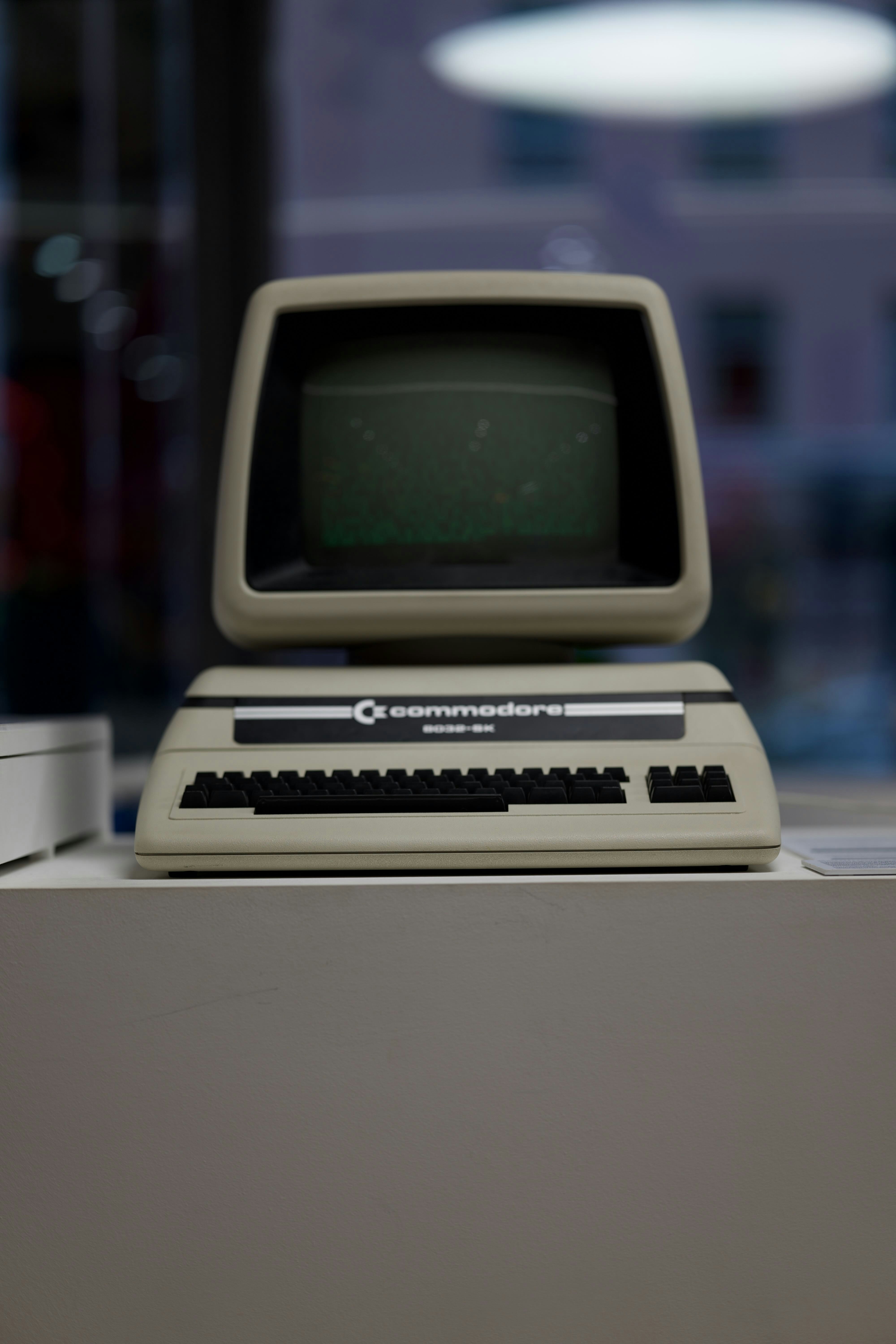 A vintage commodore computer sits on display.