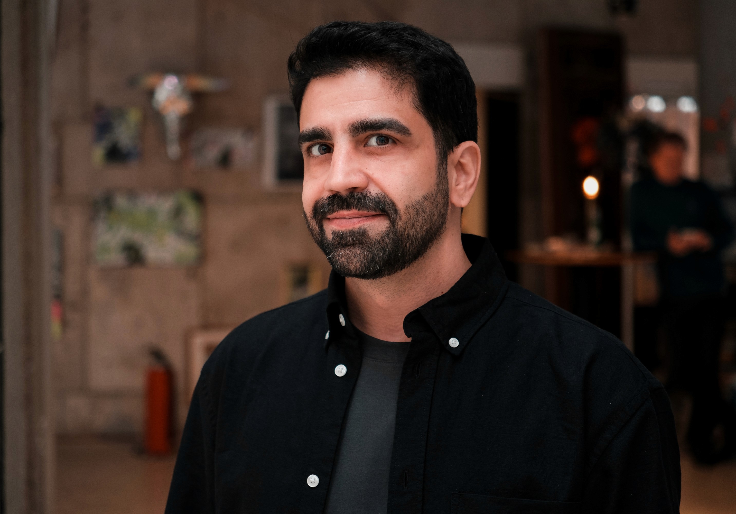 A young man riding a bicycle