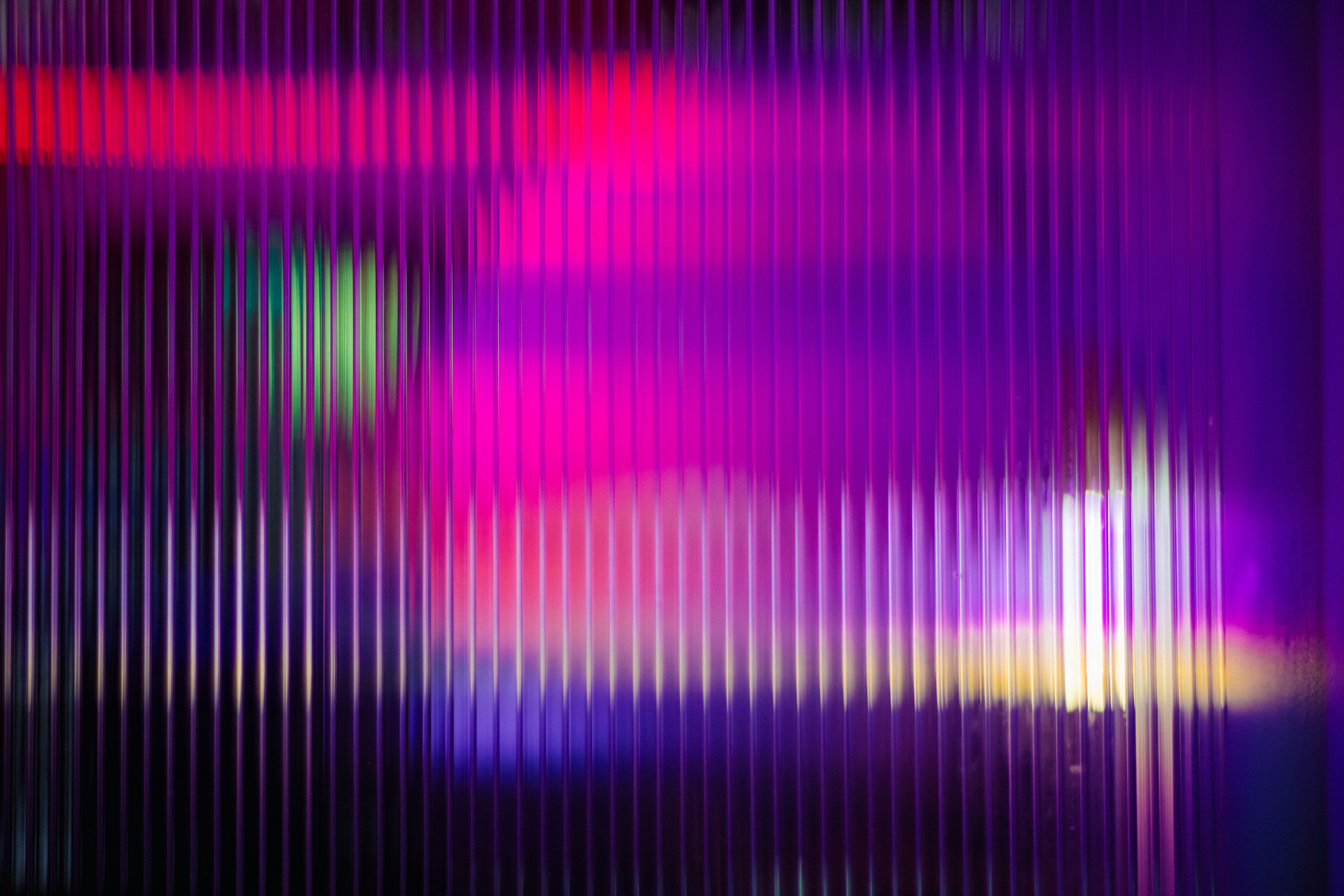 a group of people standing in a dark room