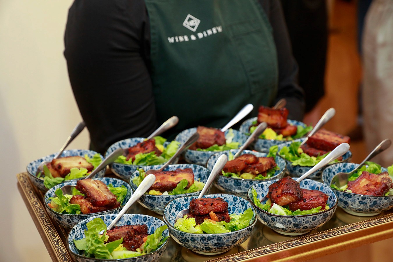 Waitstaff serving substantial canape bowls