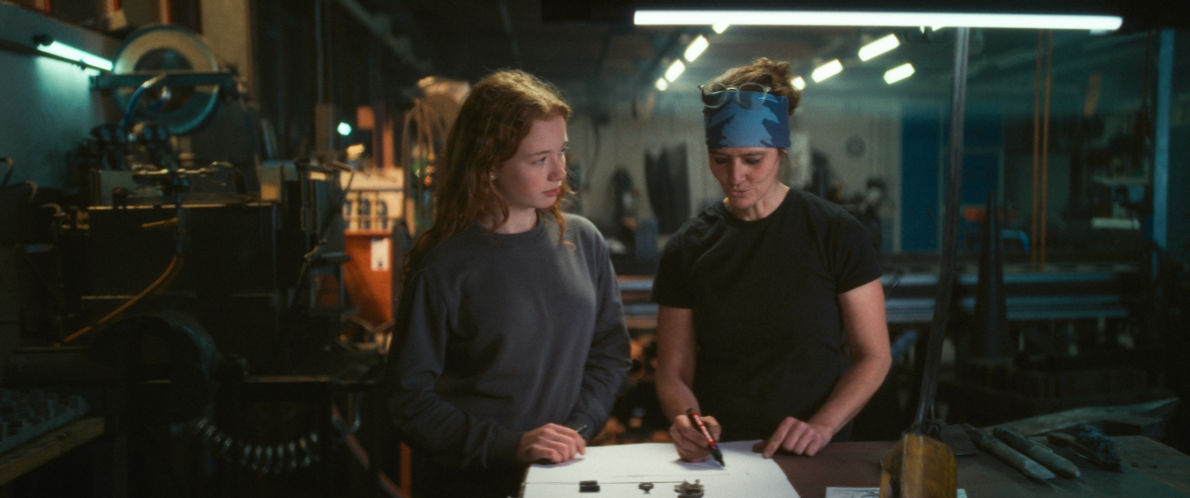 Streetside billboard with flyposters of the Batch.Works brand and illustrations