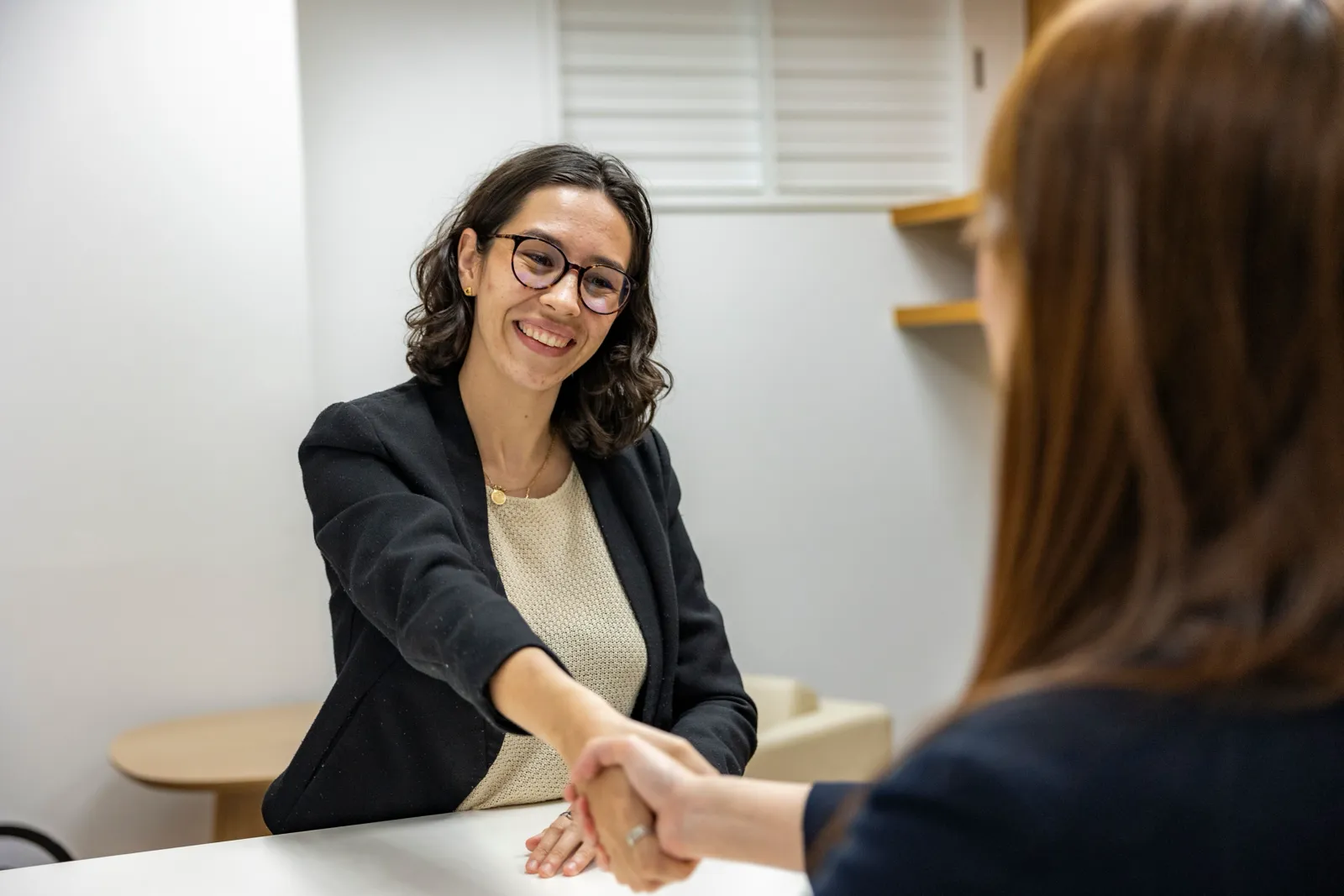 Beautiful Women Smiling While at Work