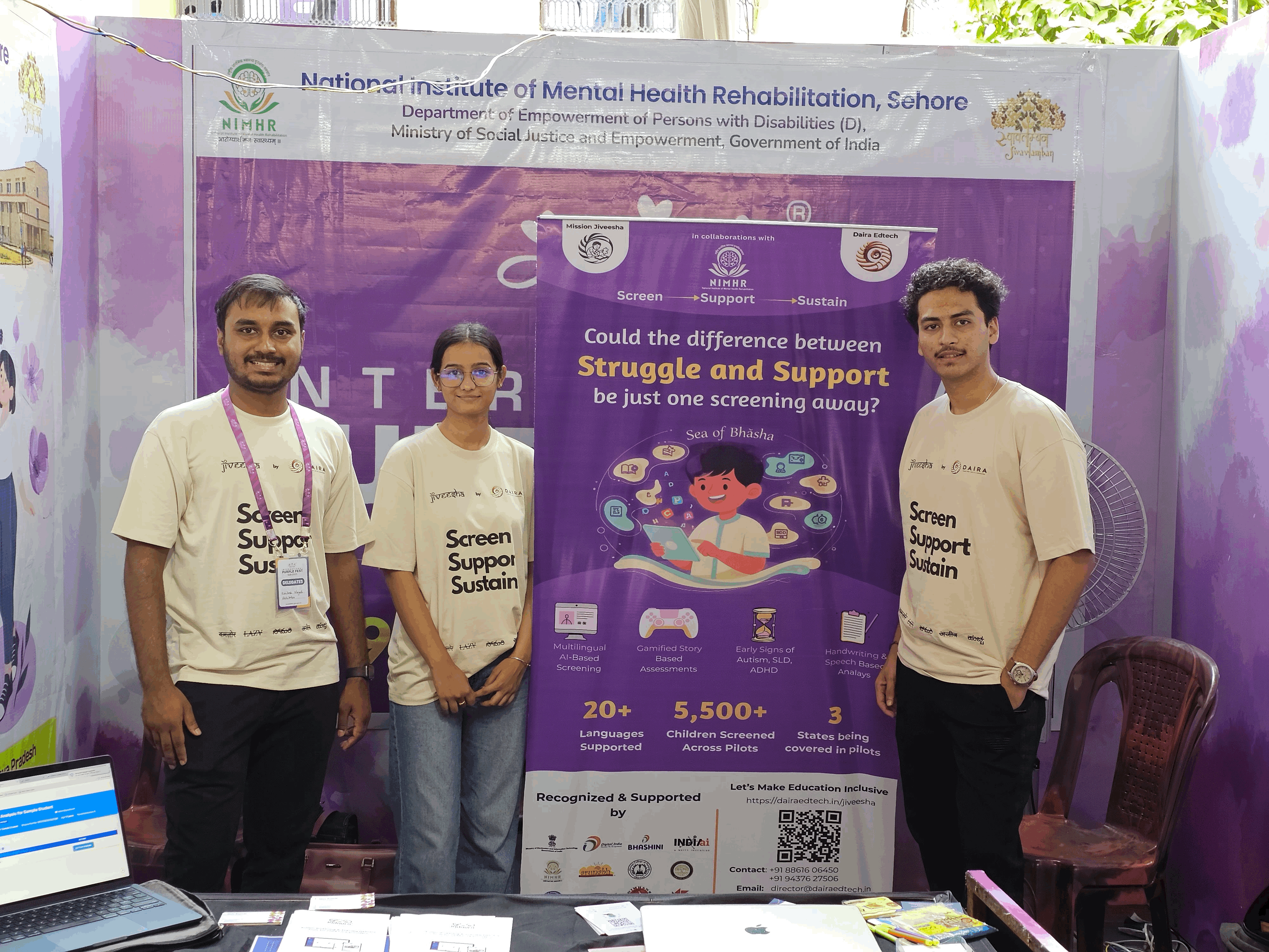 a black and white living room with a large tv