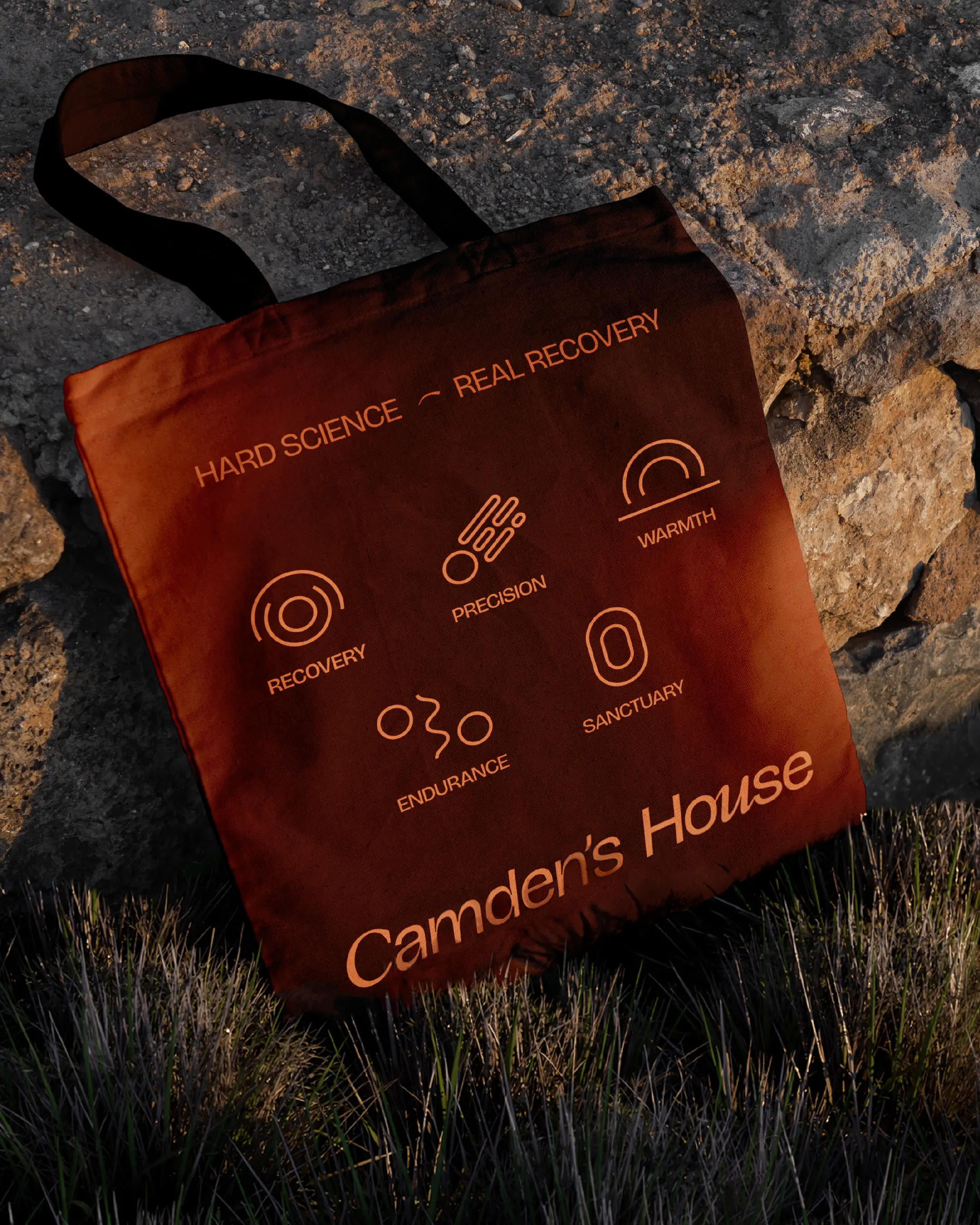 Camden's House brand identity — branded tote bag with custom iconography and wordmark logo