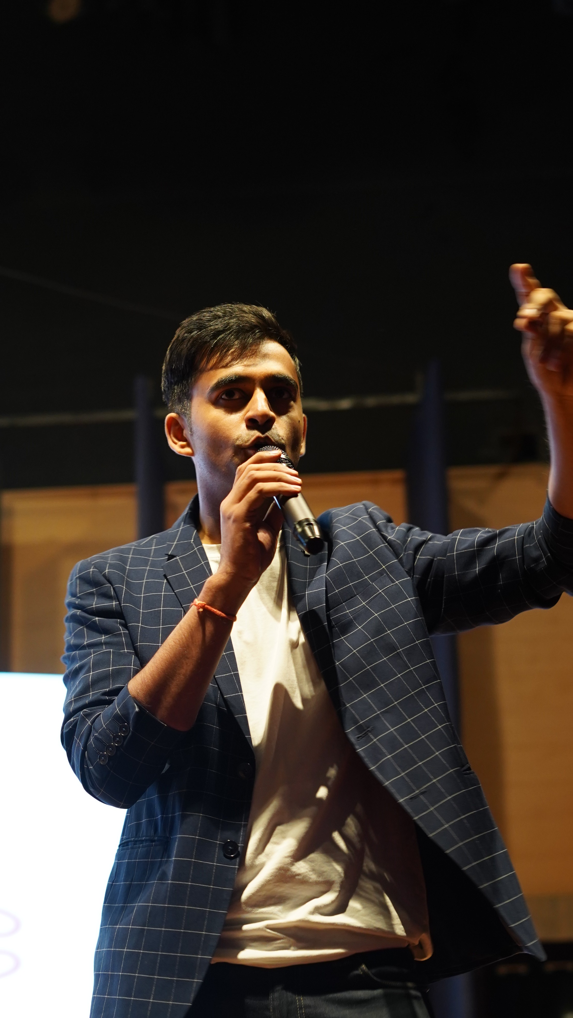 a man holding a microphone in his hands