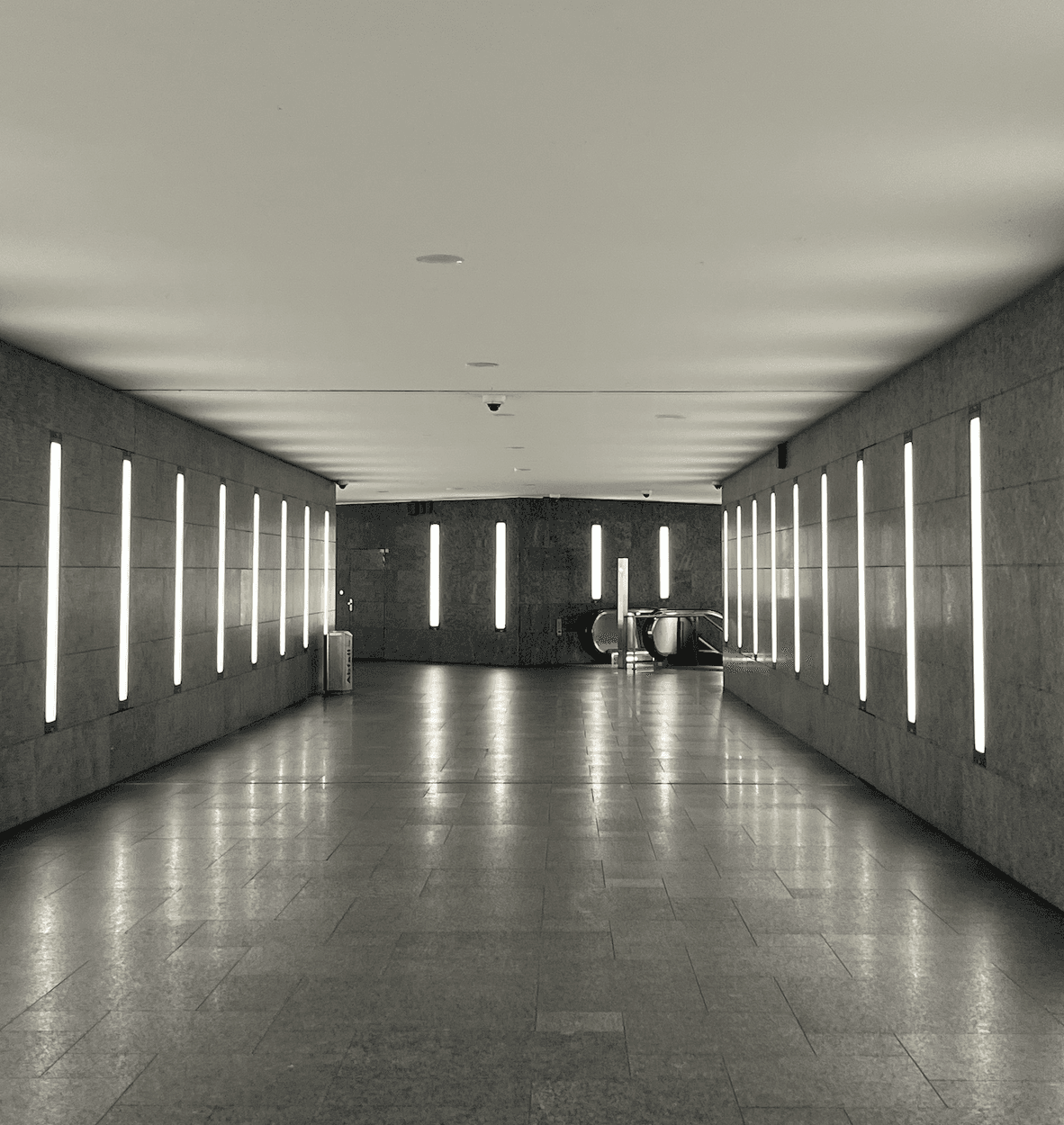 people in a large building with Tate Modern in the background
