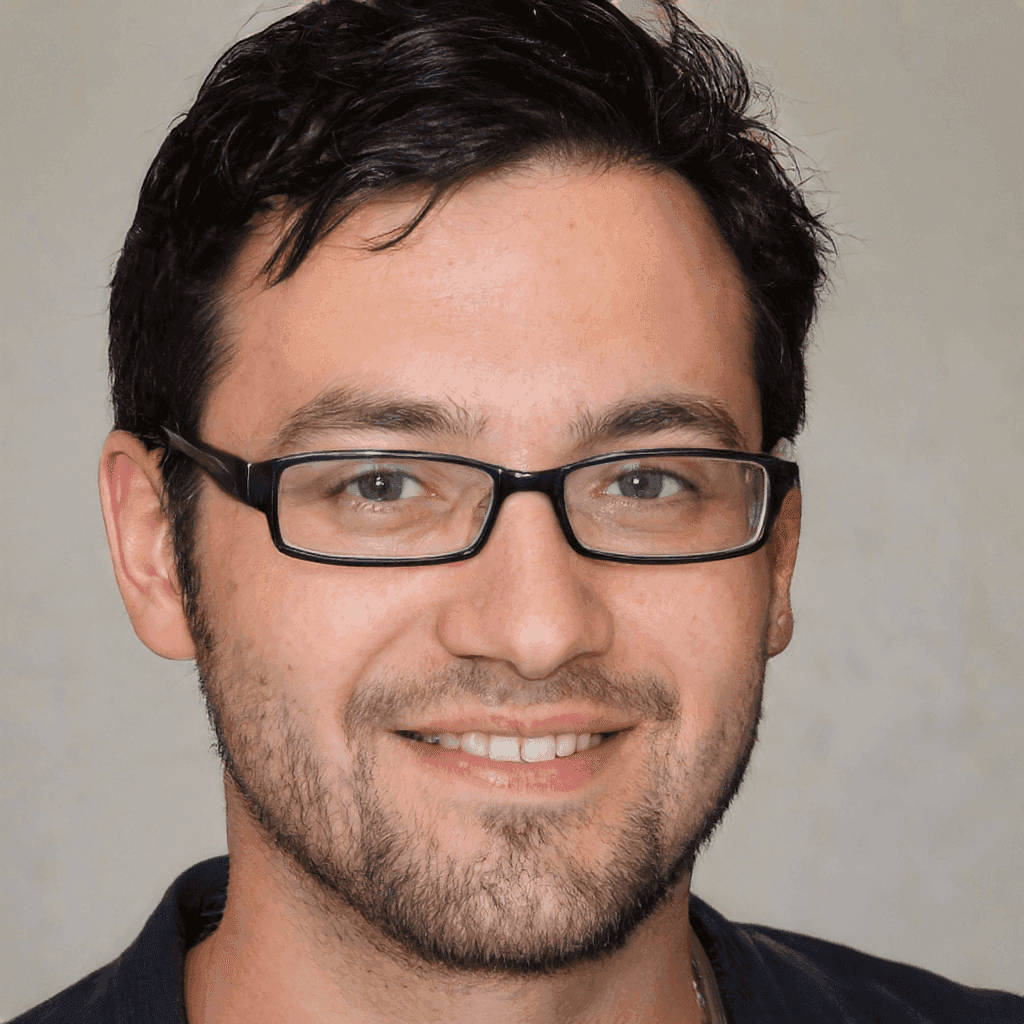 Photo of a Man in Glasses