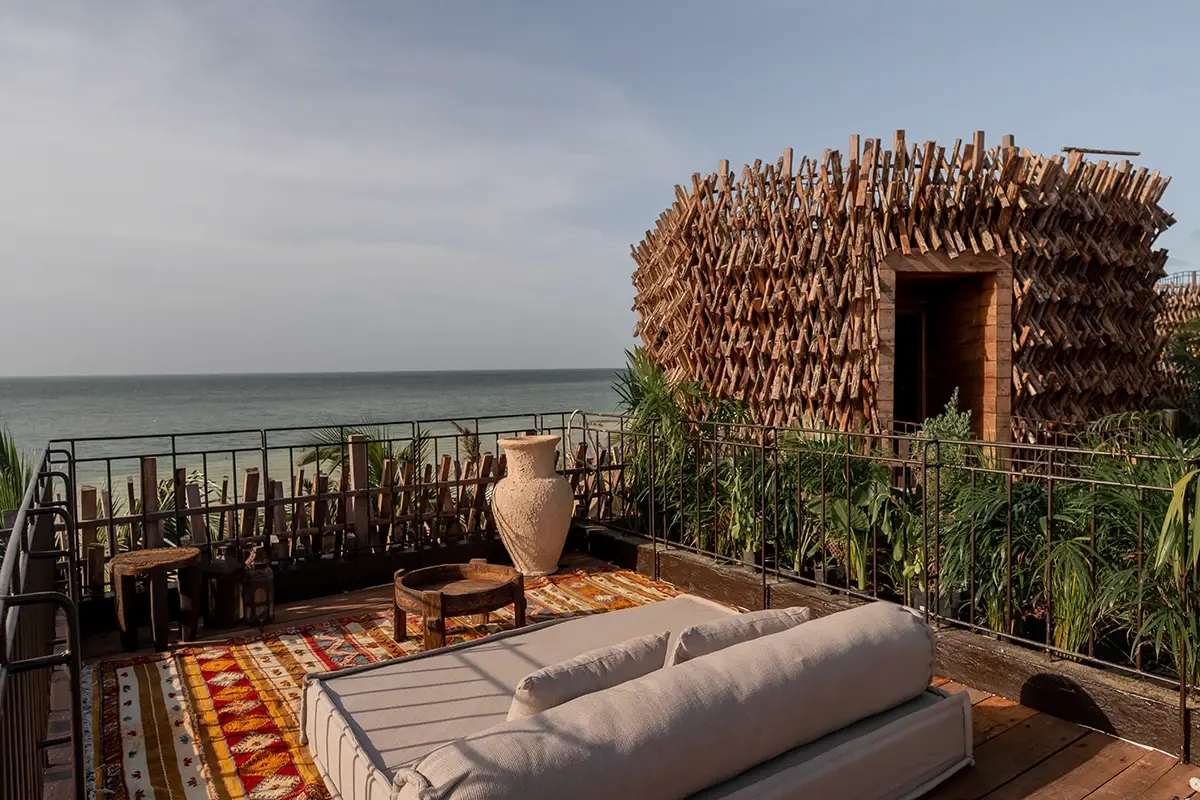Unique and luxurious treehouse suite at Nomade Holbox in Holbox Mexico, surrounded by lush tropical plants and ocean views