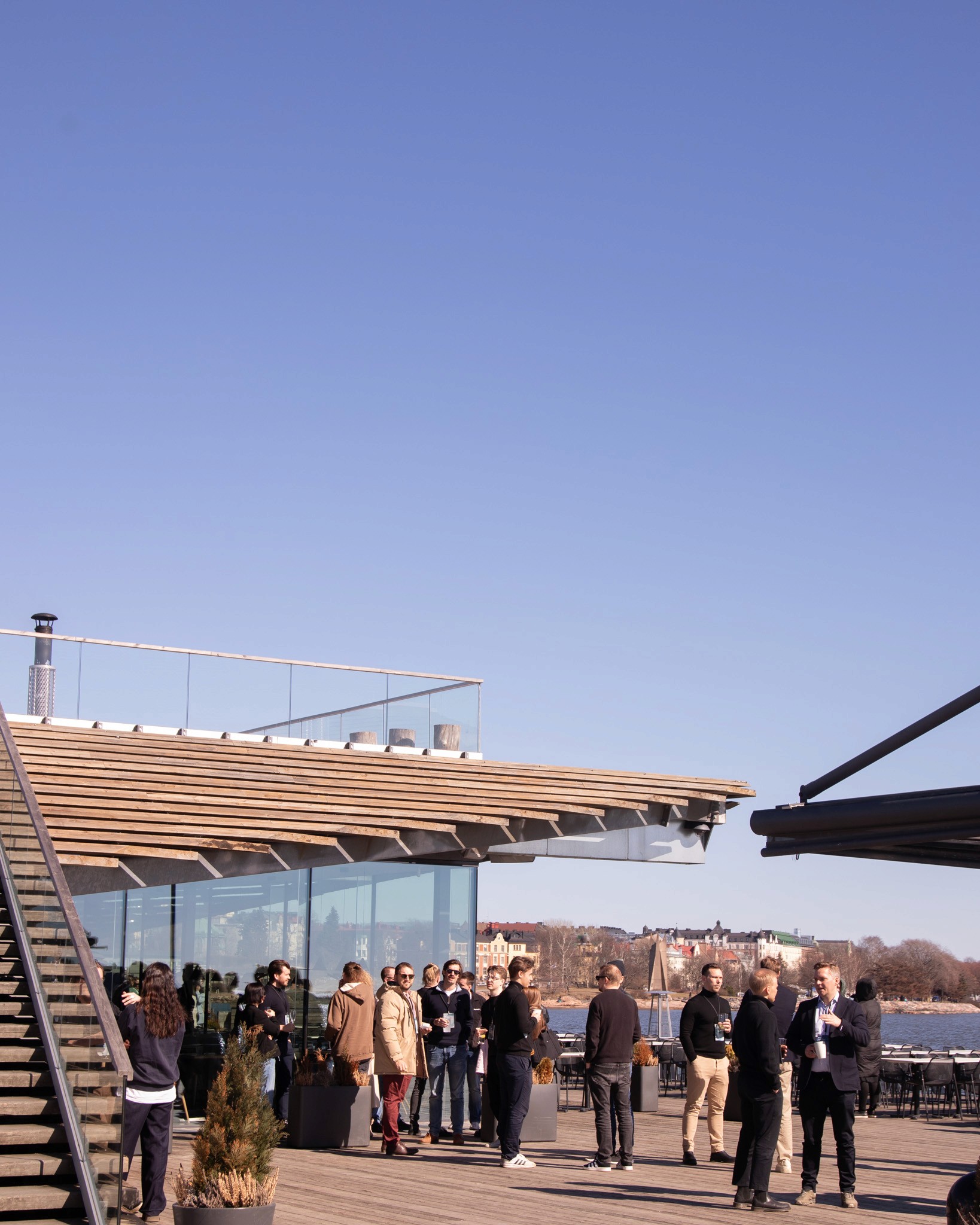 Löyly's terrace — blue skies, spring sunshine, and the right crowd