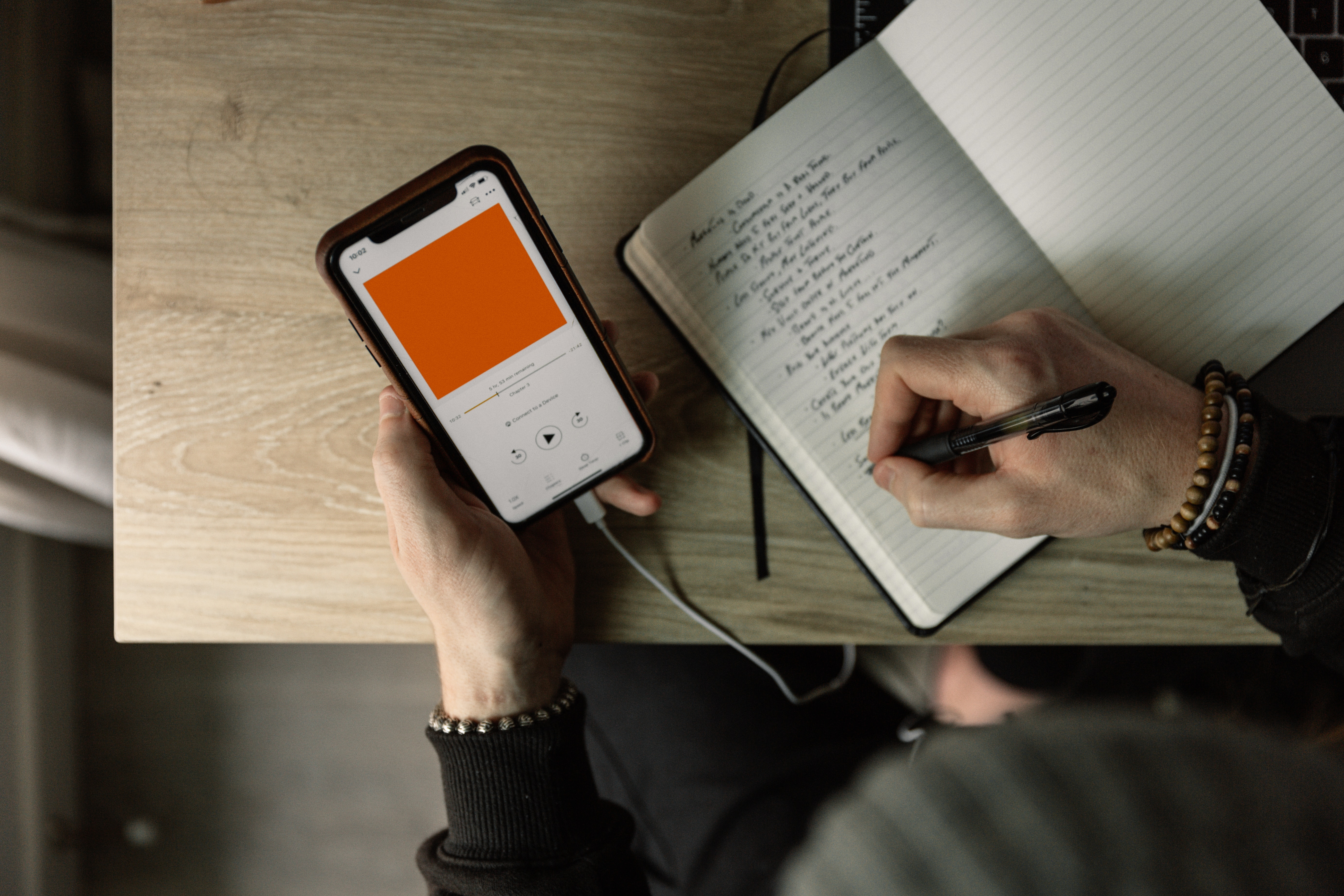 woman writing down lyrics of a song - ai remix songs