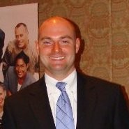 man wearing blue and red collared shirt