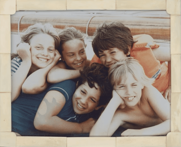 Vintage photo of the young cousins smiling together