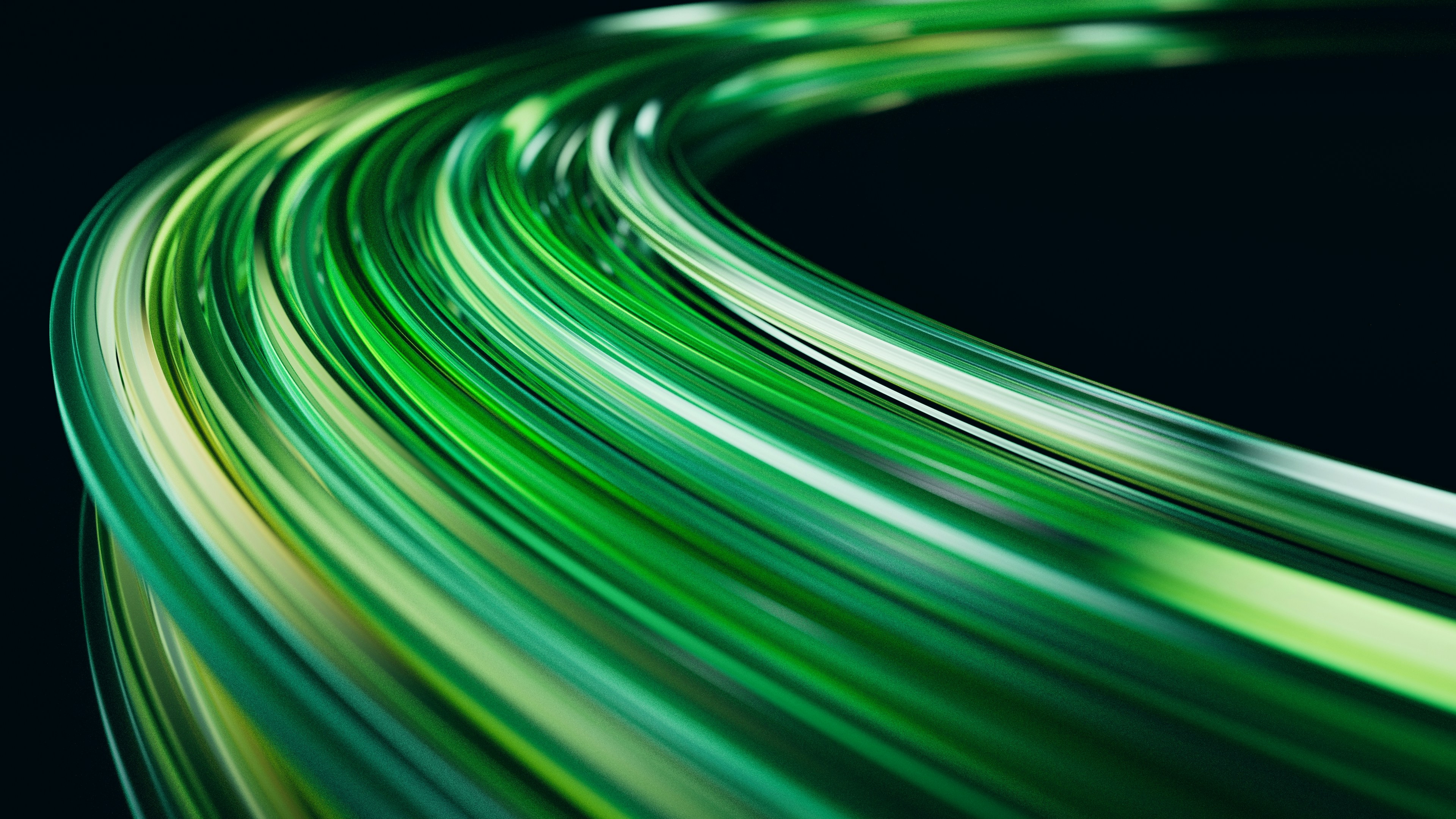 Abstract flowing green lines on black background