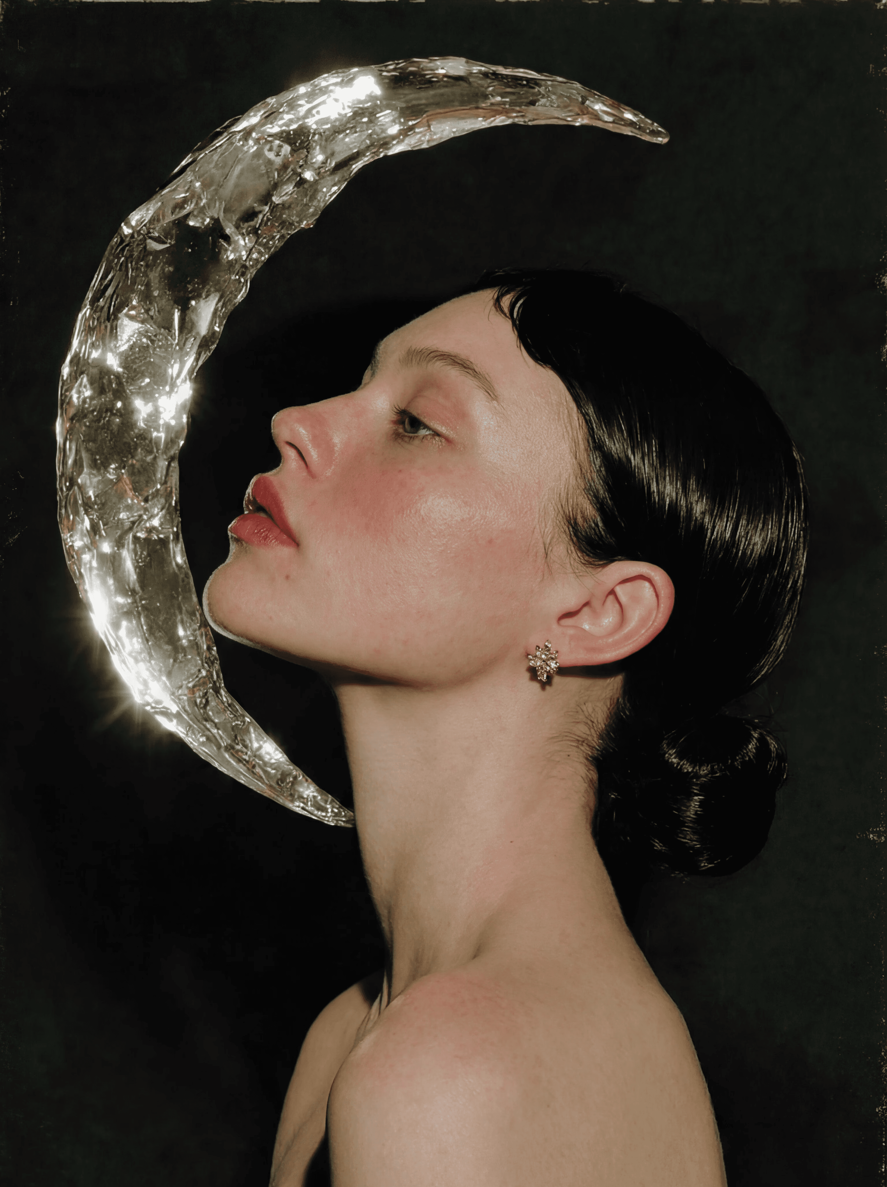 Editorial portrait with crescent moon