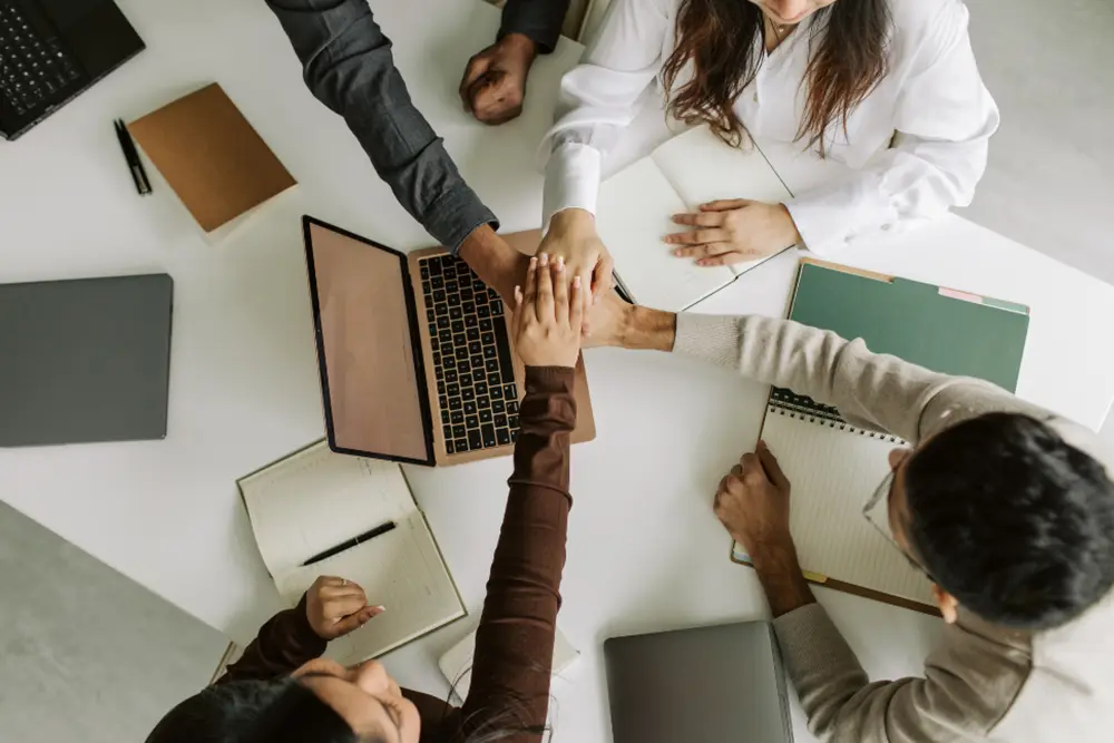 A behavioral health care team showing signs of burnout and fatigue in a clinical workplace.