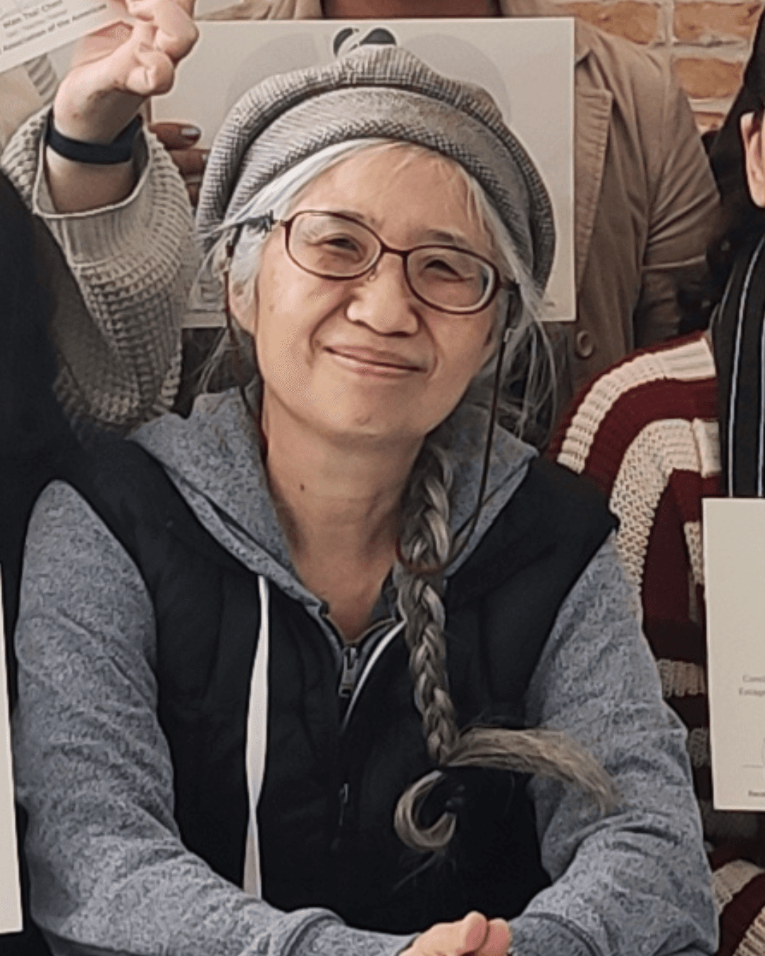 baby playing multicolored xylophone toy