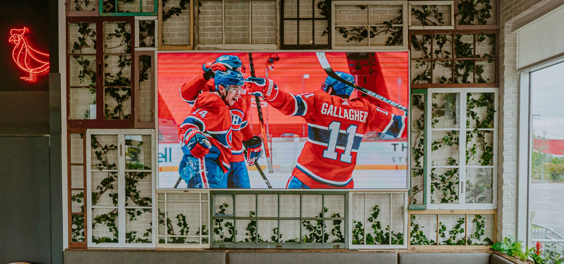 A television playing a Montreal Canadiens game at the Birdhouse restaurant