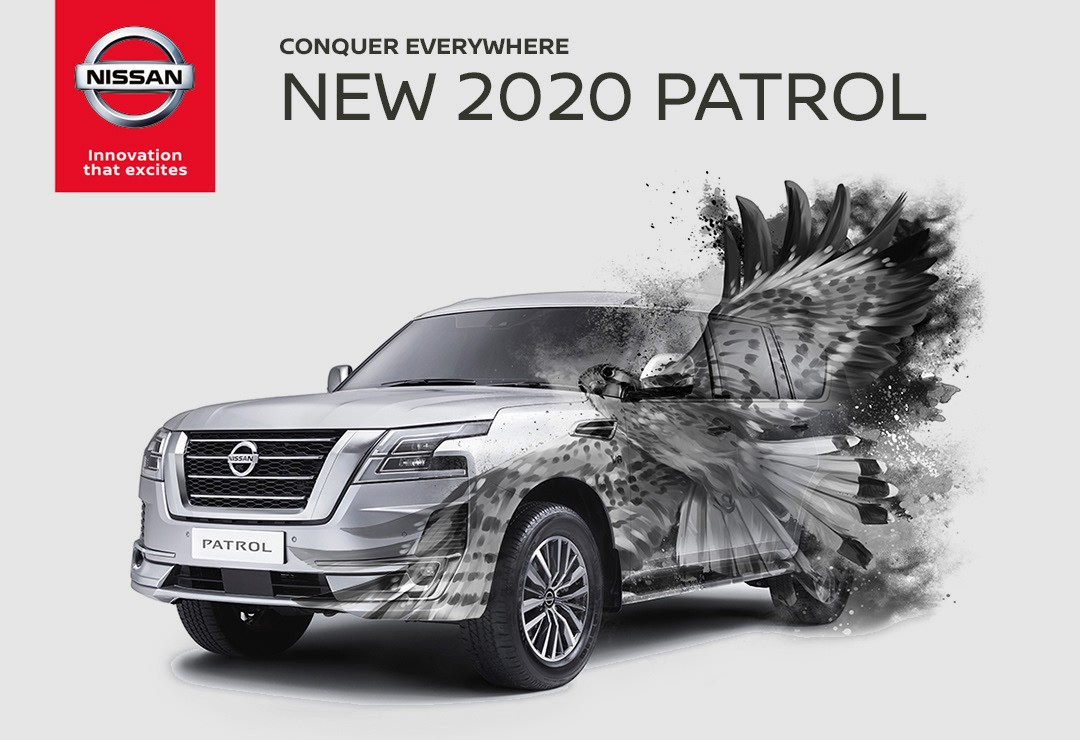 A concept ad for the 2020 Nissan Patrol: the silver SUV's rear half transforming into a falcon's outstretched wings, breaking into a spray of dust, on a light grey background.
