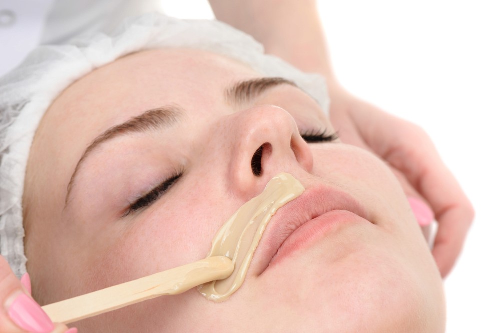 female upper lip waxing hair removal