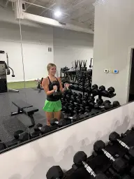 man in black hoodie standing