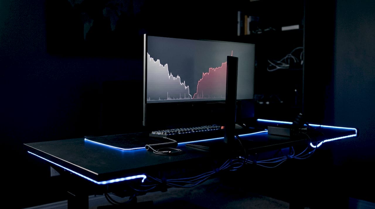 Workspace featuring glowing market depth chart