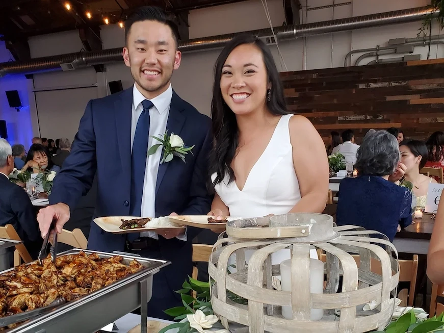 Wedding catering by Buddha Bruddah with happy bride and groom