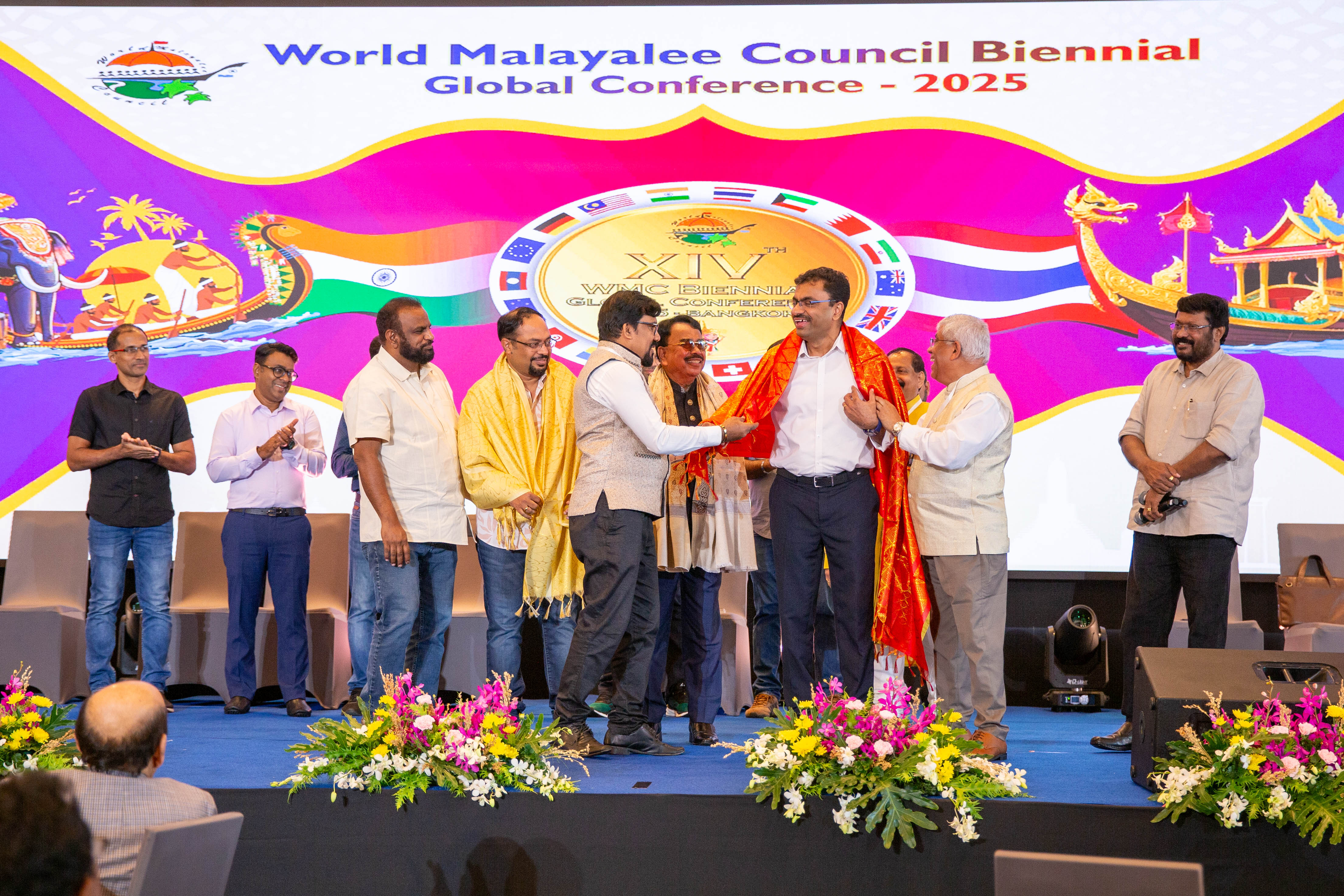 Bokeh lights over misty mountains at sunset