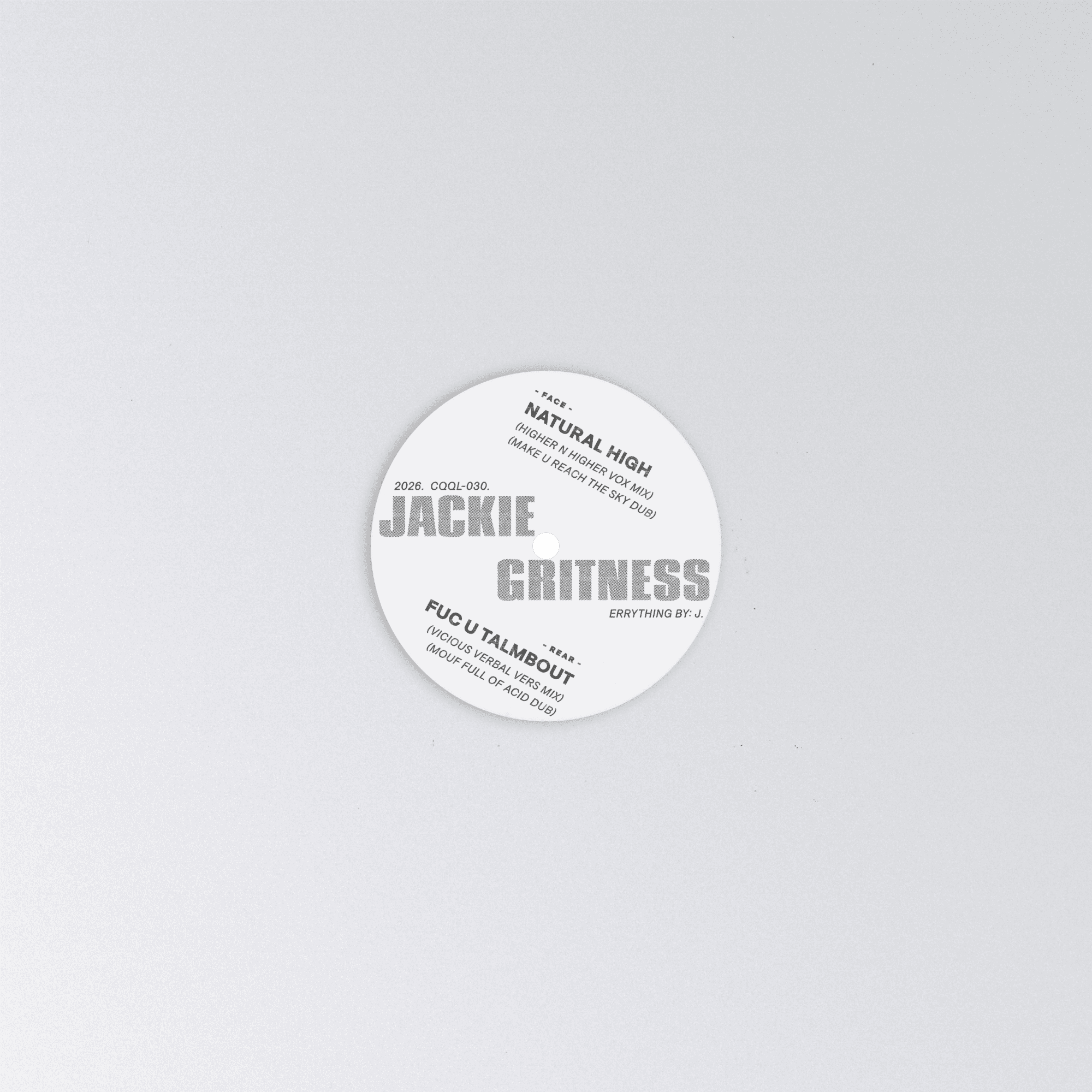 Round white sticker with text on a light gray background