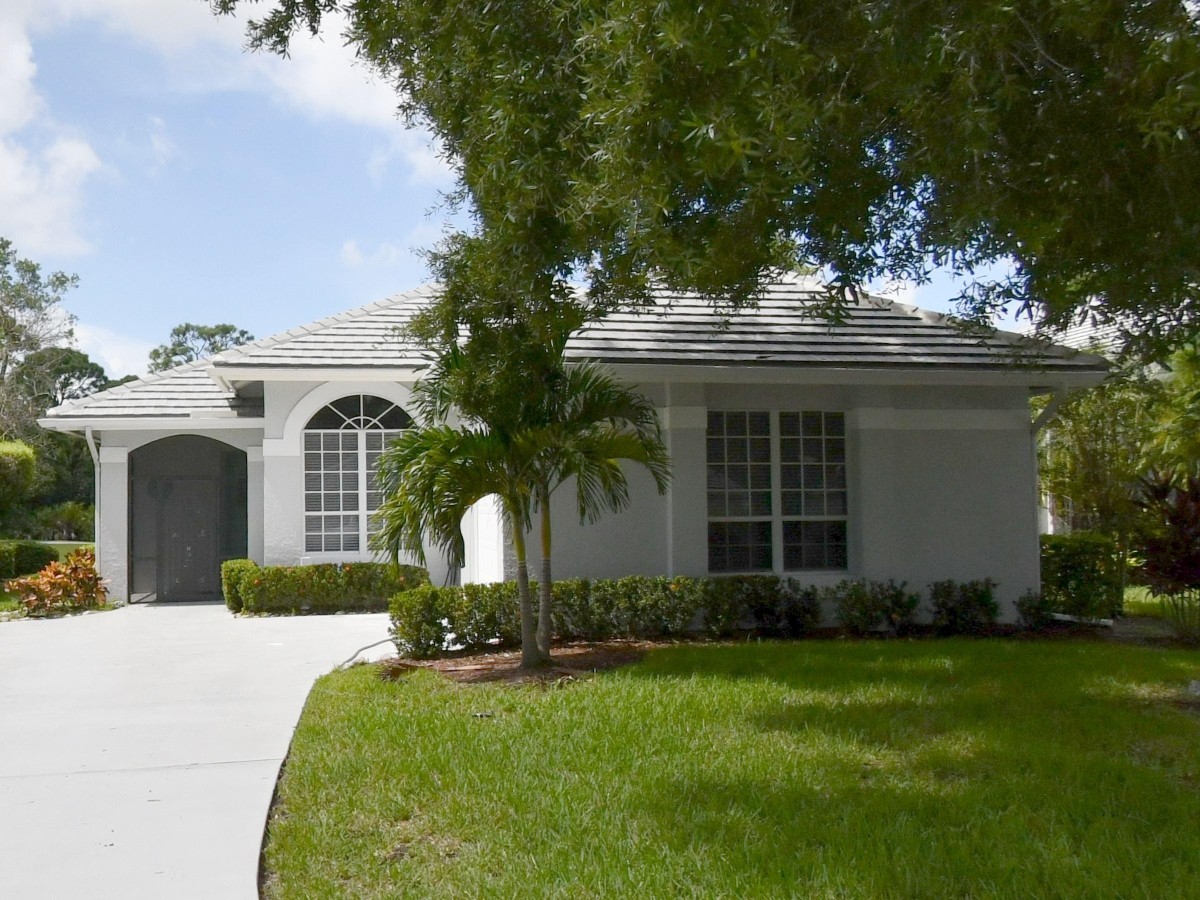 1994 New Roof Construction in Marsh Landing, PGA Village, Port St Lucie with Entegra Flat Broomswept Tile in Natural Gray
