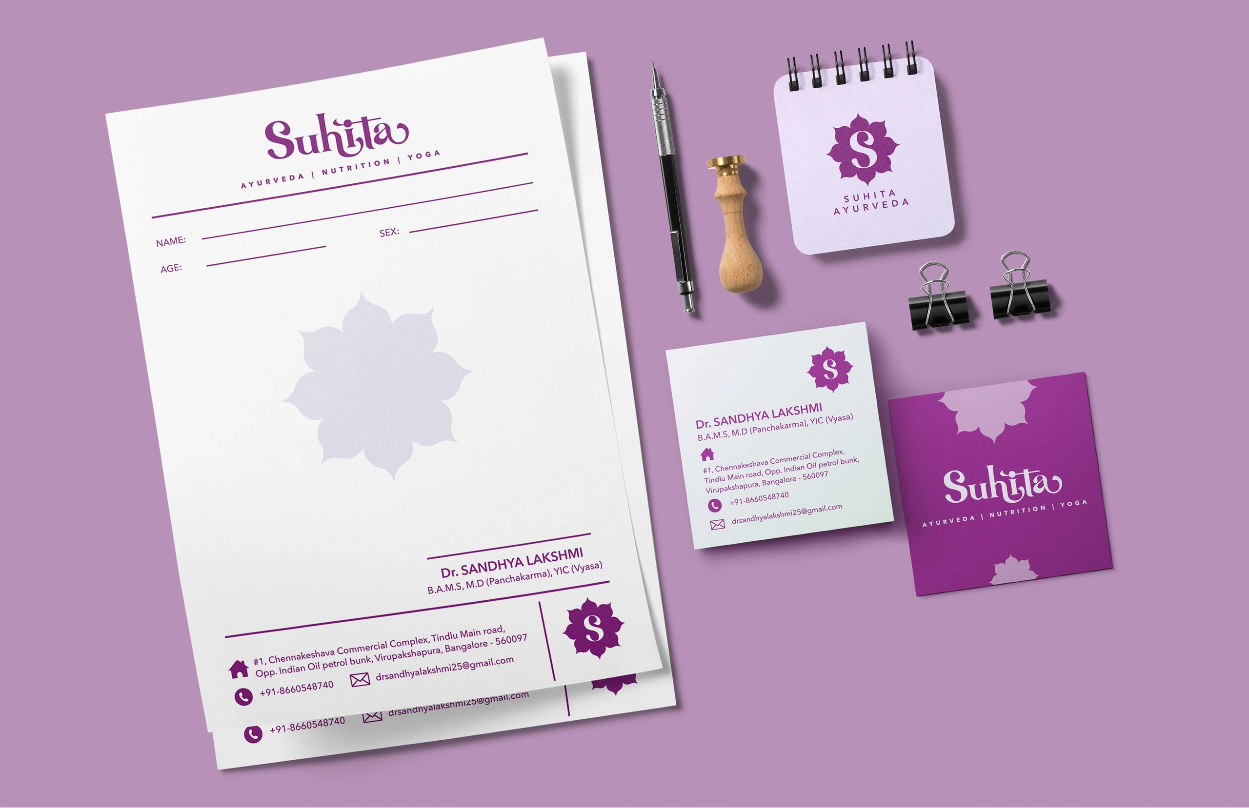 Complete stationery branding set for Suhita Ayurveda including letterhead, business card, and notepad image