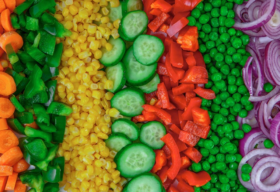 person writing on a piece of paper 