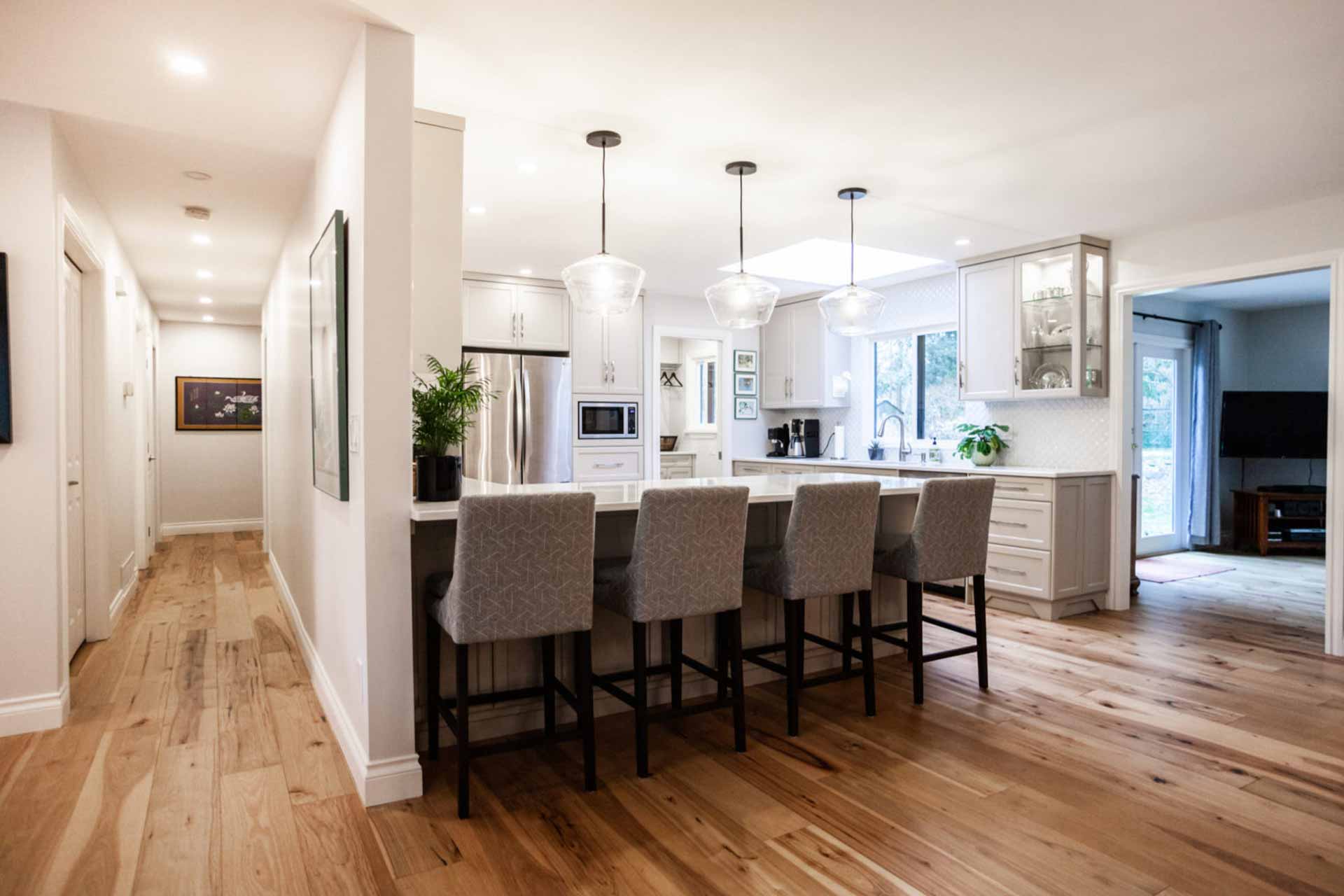 bar seating at kitchen interior design warm lighting 