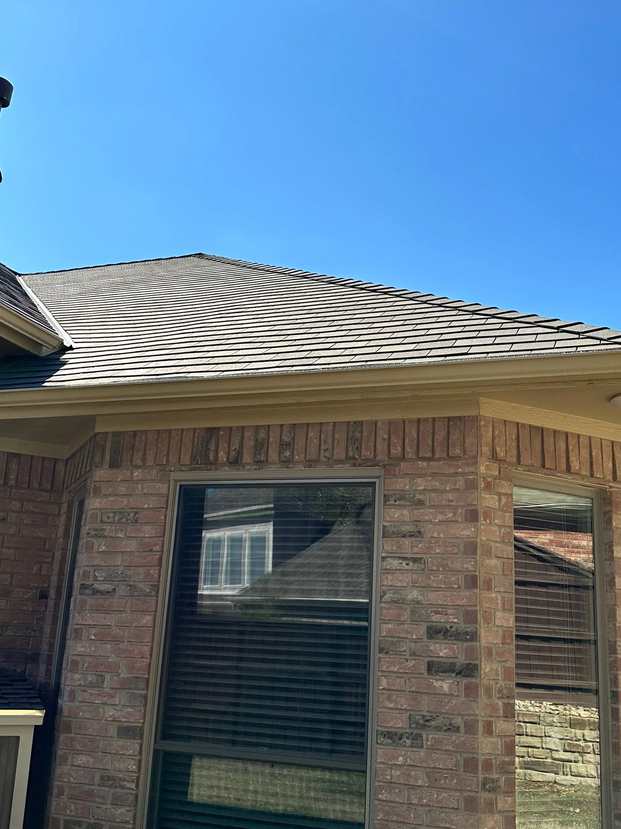 Rear roof angle showing new F-Wave shingles in Southlake TX
