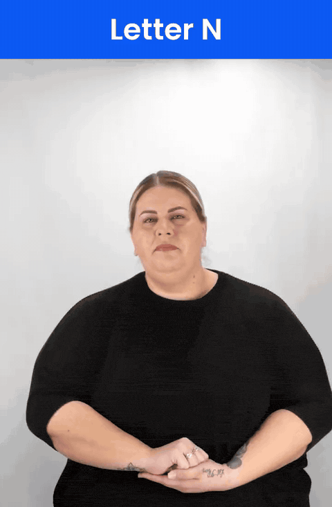 Animated GIF: a Deaf signer signs N in ASL, two fingers folded over the thumb.