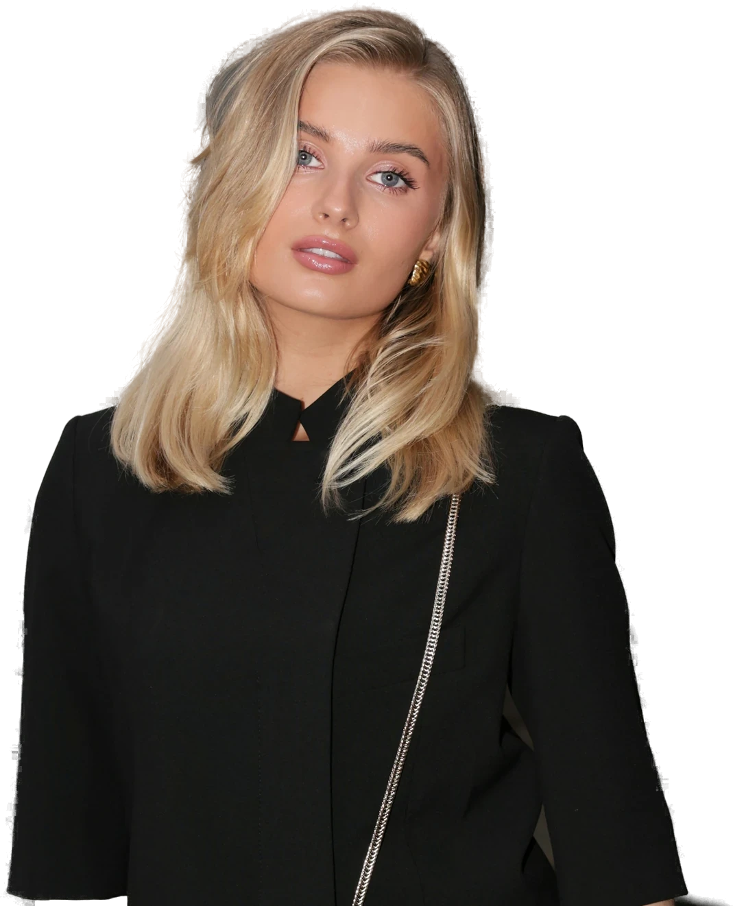 Honey in a black jacket, smiling