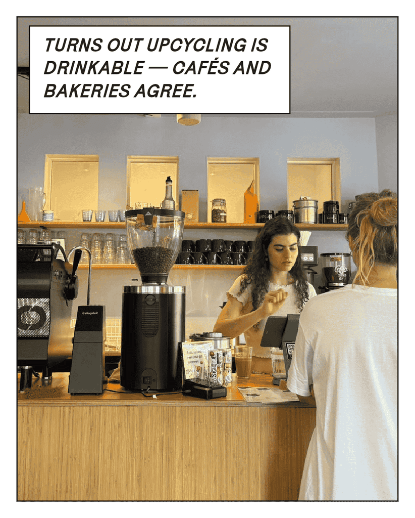 Café scene with Cascara Cabinet cans on the counter — caption “Turns out upcycling is drinkable — cafés and bakeries agree.” showing real-world adoption.