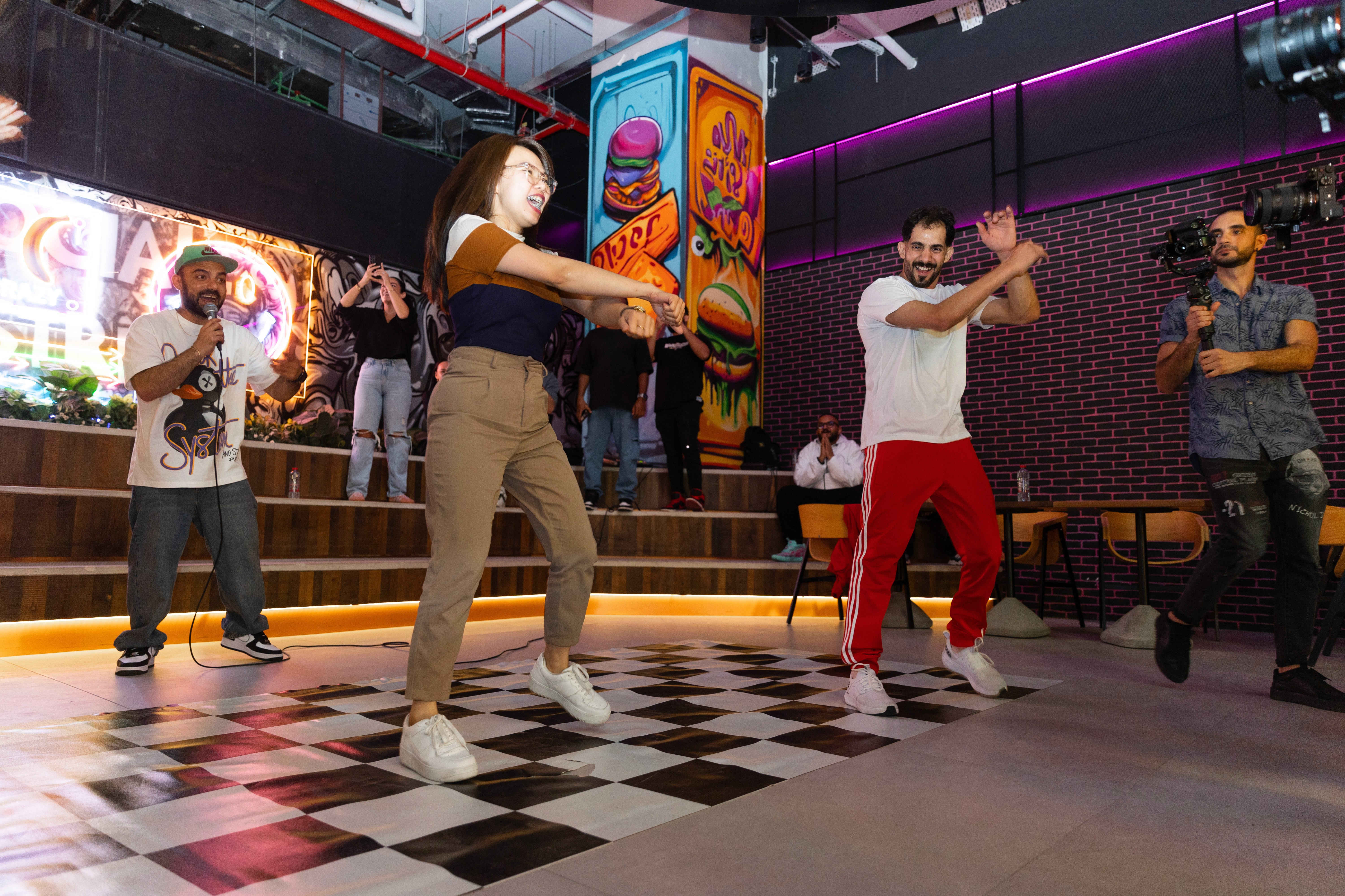 Interactive entertainment in Dubai with performers engaging guests during corporate event entertainment and brand activations.