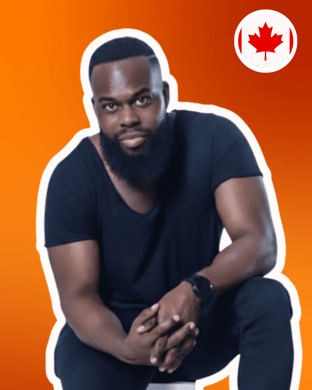A smiling person with curly hair, wearing a leather jacket, stands in a cozy indoor setting.