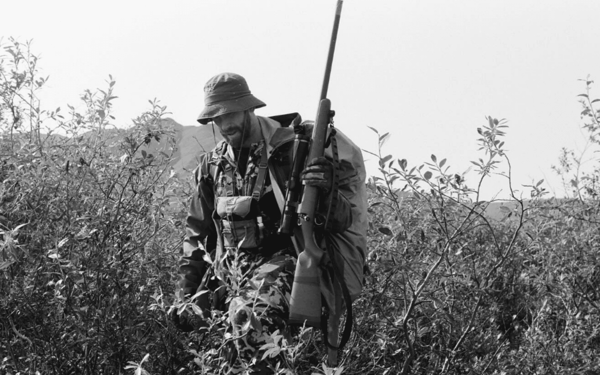 a hunter packing through the Alaskan bush