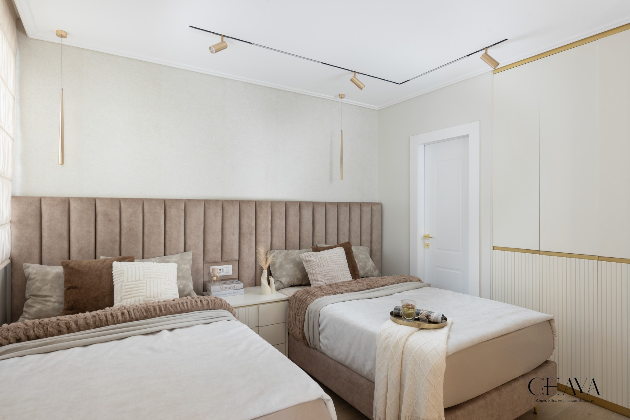 green chairs under umbrellas on shore