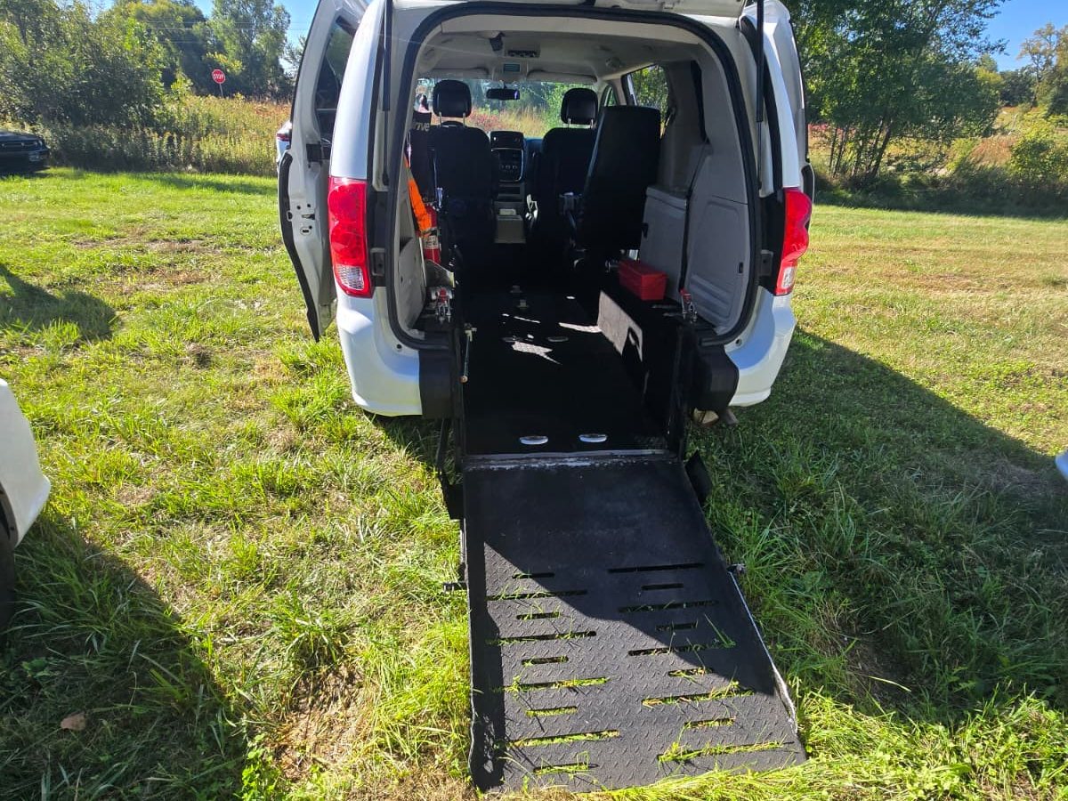 Golden Assisted Transportation's wheelchair van with the rear ramp lowered
