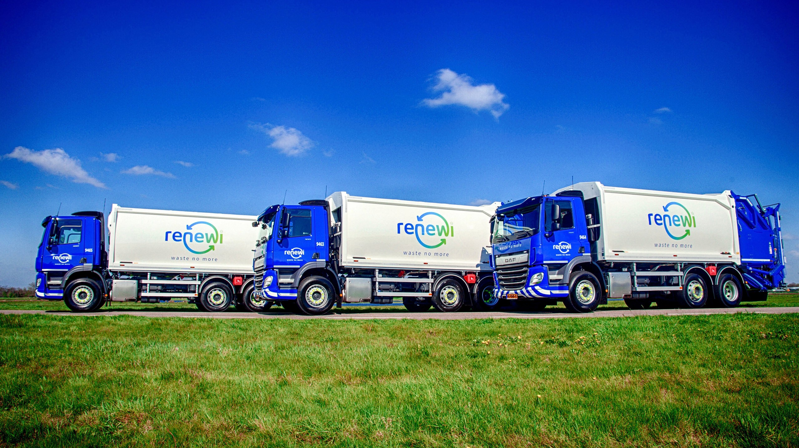 three rebranded rubbish trucks