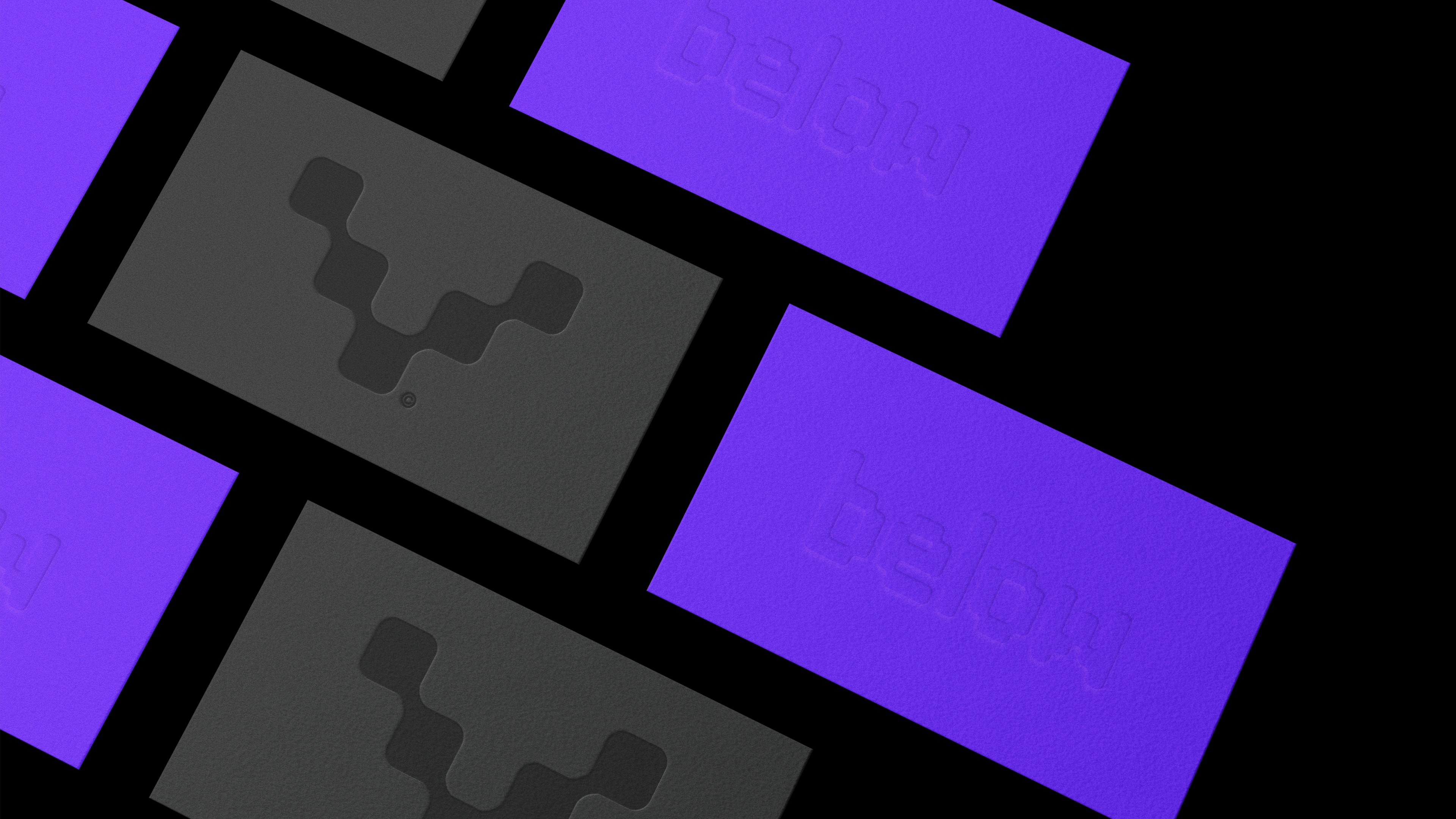 Modern home office setup with a monitor, ergonomic chair, keyboard, and indoor plants near a window with blinds.