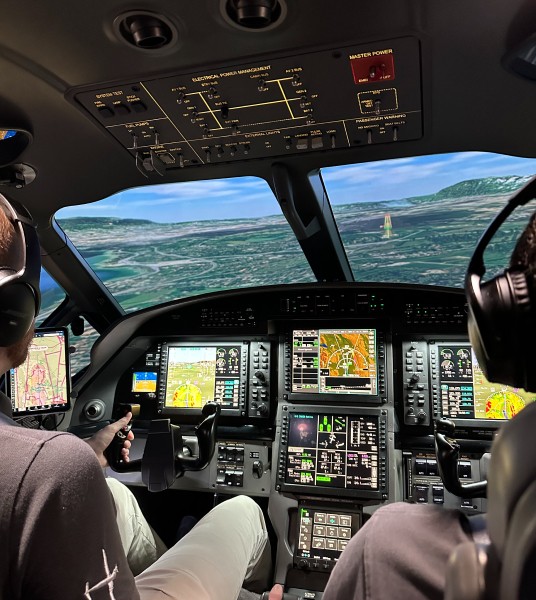 Pilots training in the Pilatus PC-12 simulator