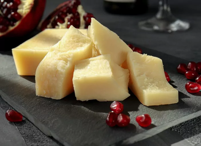 Pomegranate seeds with crumbled cheese