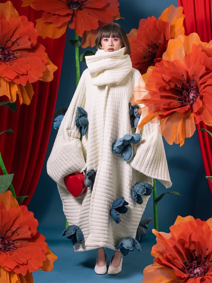 psoing for a picture in a colorful background