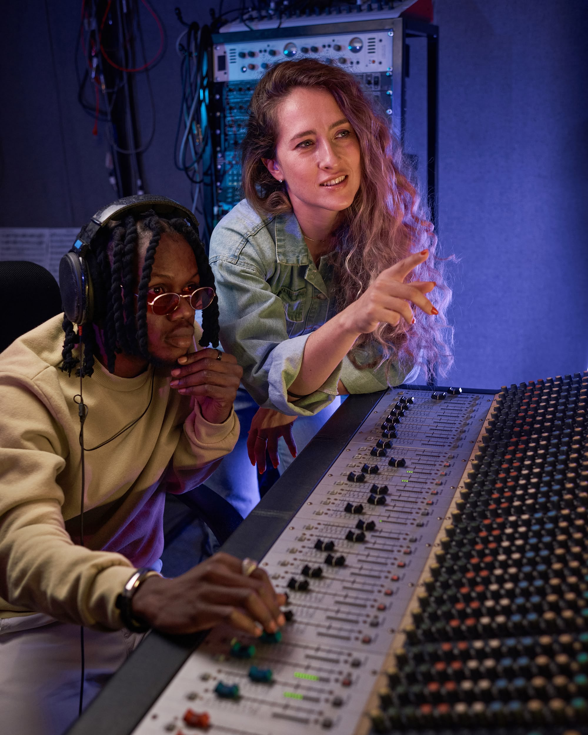 Man and woman in producer studio